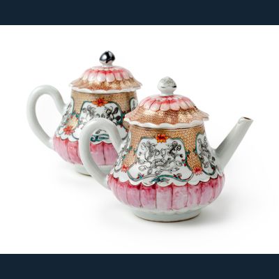 A pair of Chinese famille rose lotus-shaped teapots and covers