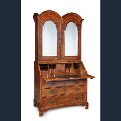 A Walnut double domed bureau bookcase