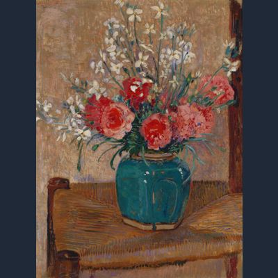 Flowers in a pot on a cane chair