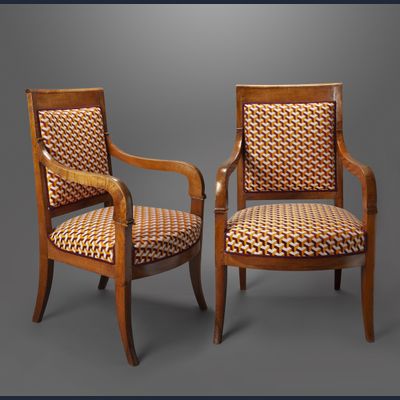 Pair of Empire fauteuils with modern upholstery.