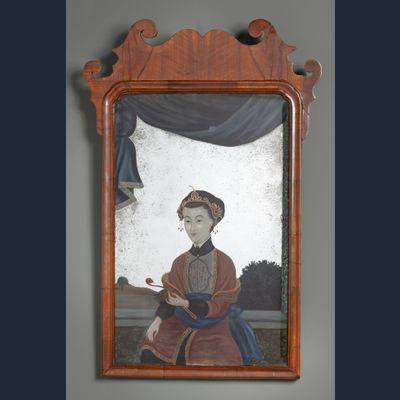 A George II Chinese export glass painted mirror