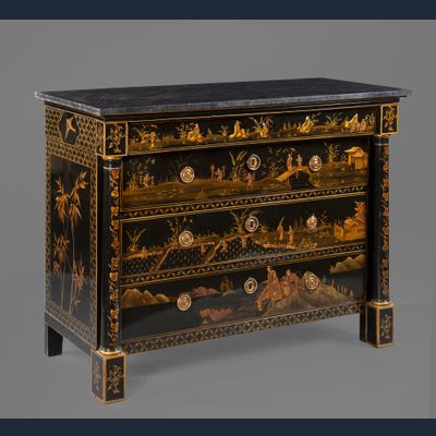 AN ORMOLU MOUNTED CHINOISERIE LACQUERED COMMODE SELECTED BY HUBERT DE GIVENCHY