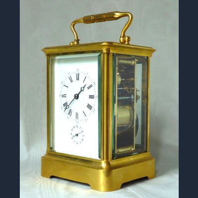 Mooie  Franse reisklok, vergulde kast, grande sonnerie slagwerk, circa 1870.