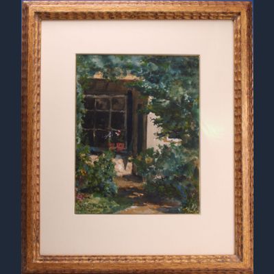 Gezicht op achterzijde huis met tuin.