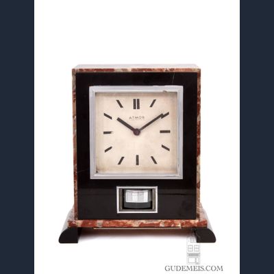 Een Franse Art Deco marmeren Reutter patent atmos klok, circa 1932