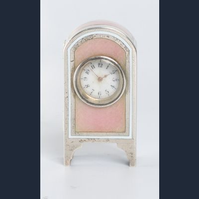 A miniature Swiss silver pink translucent guilloche enamel timepiece, circa 1900.