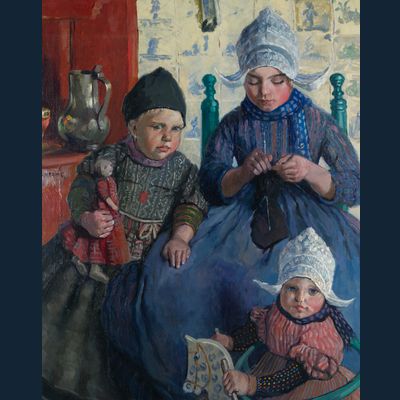 Drie kinderen in Volendamse klederdracht