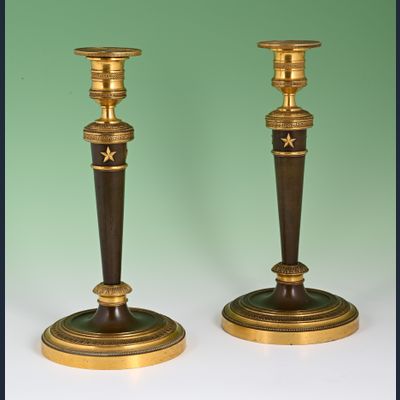 A pair of Directoire candlesticks