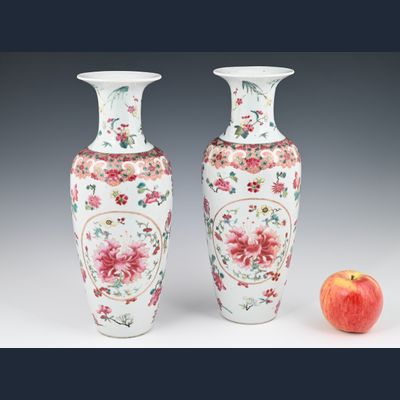 A pair of Chinese porcelain Famille Rose baluster Vases.
