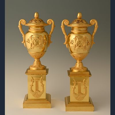 A pair of ormolu Empire Cassolettes