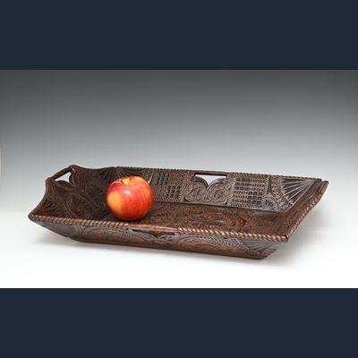 Een eikenhouten luiermand