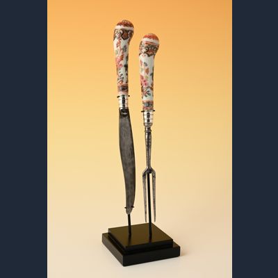 Een mes en vork met Chinees porseleinen greep