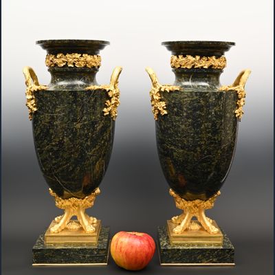 A pair of large marble decorative vases