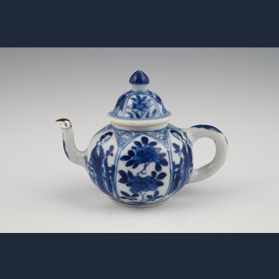 A miniature Chinese porcelain teapot.