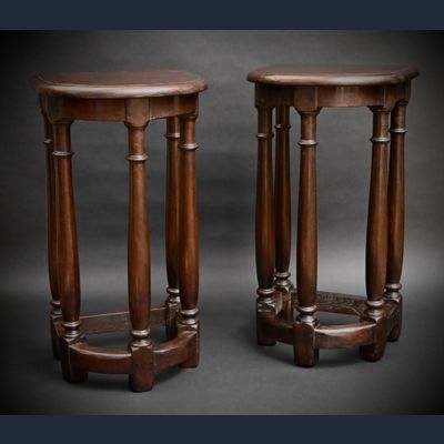 A pair of decorative oak stools