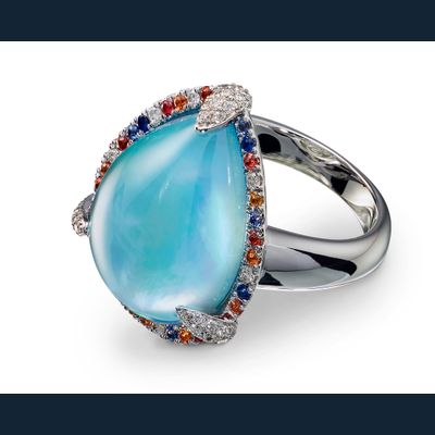 Ring with blue topaz diamonds and sapphire