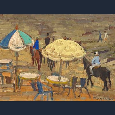 Ruiters op het strand