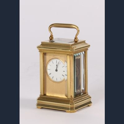 A lovely French miniature brass carriage timepiece, circa 1880