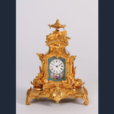 A miniature French Napoleon III Sèvres mounted gilt bronze mantel timepiece, circa 1870
