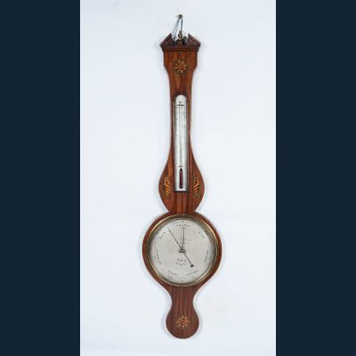 A good English mahogany inlaid wheelbarometer by L. Giannal Salop, circa 1820.