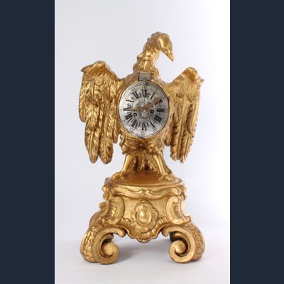 A decorative South German parcel gilt sculptural table clock, circa 1730.
