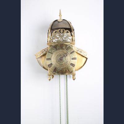 A good English brass striking and alarm 'wings' lantern clock, circa 1680