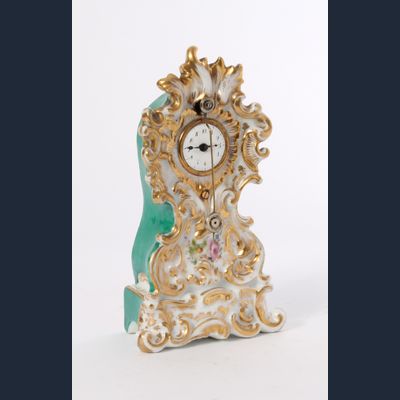 A small French polychrome porcelain so-called 'Zappler' timepiece, by Jacob Petit, circa 1850
