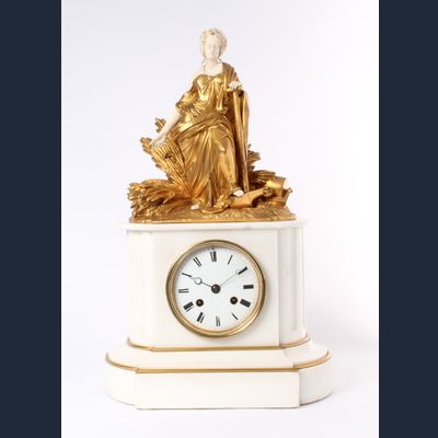 A French Napoleon III gilt marble gilt bronze and ivory sculptural mantel clock, circa 1860