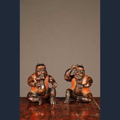 A set of two probably Japanese carved boxwood 'satyr' figures, circa 1880.