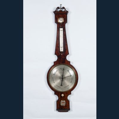 An imposing king size wheel barometer by 