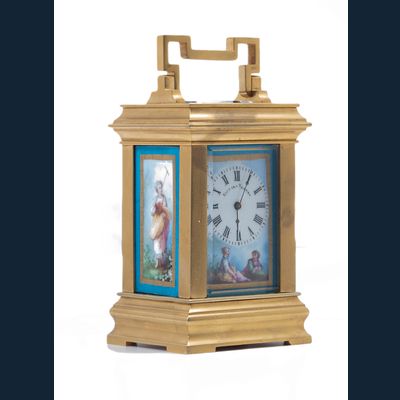 A charming small French 'Sevres' panelled ormolu carriage clock, circa 1900