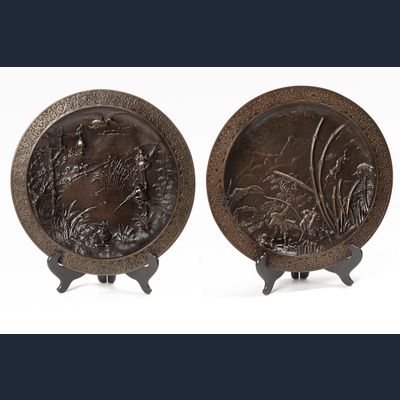 A lovely pair of far East bronze circular wall decoration circa 1880