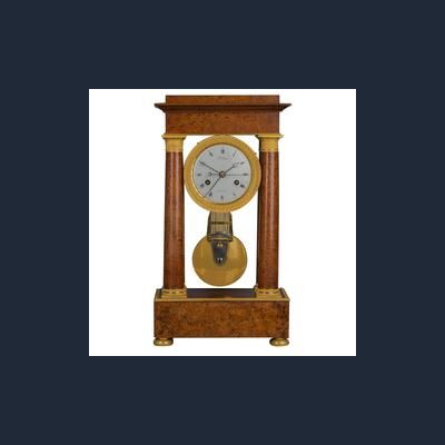 A good  well figured Empire burr walnut 4 pillar table regulator, signed