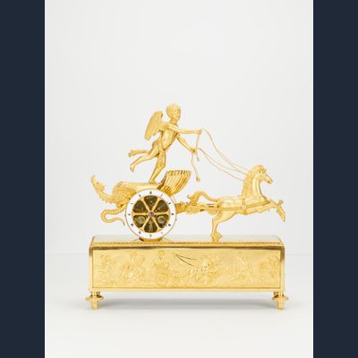 A charming French Empire ormolu chariot clock, circa 1810