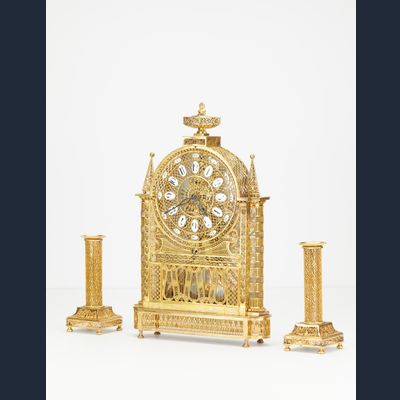 An unusual French Louis XVI filigree skeleton clock set, circa 1780