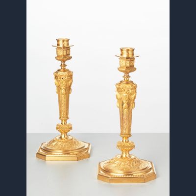 A fine pair of French Regency inspired gilt bronze candlesticks, circa 1880