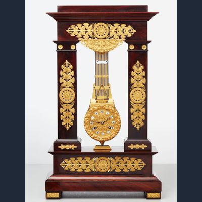 A rare French mahogany and bronze oscillating mantel clock, circa 1830