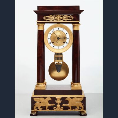 A French mahogany regulator ‘portico’ mantel clock by Montassier, circa 1820