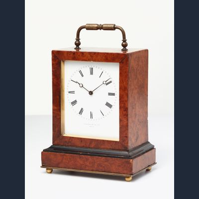 An elegant French burr-walnut ‘time-piece’ travelling clock, circa 1840