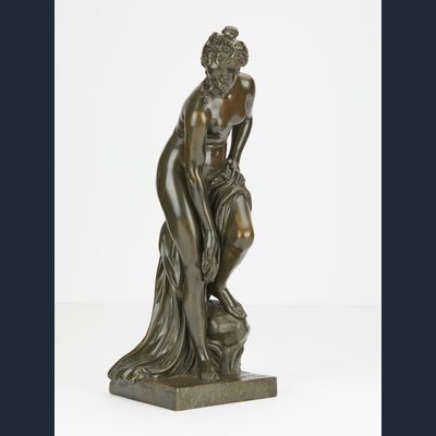 Elegant naked bronze statue