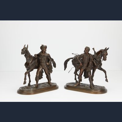 Pair or bronzes of horses with rider 