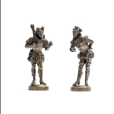 A nice pair of beautifully detailed patinated bronze men signed