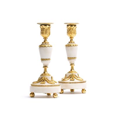 A pair of high-quality white marble candlesticks from the Louis XVI period