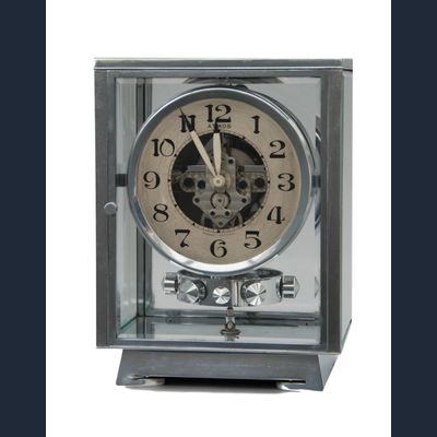 M115 Verchroomde art deco JL Reutter vier glazen Atmos klok