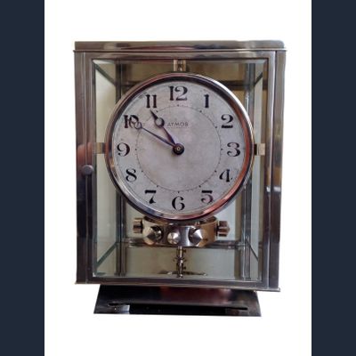 M211 Nikkelen art deco JL Reutter vier glazen Atmos klok