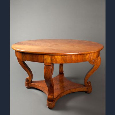 Een Uitzonderlijke Gueridontafel in Padouk en Amboyna