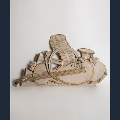 Wooden Carving Depicting Musical instruments