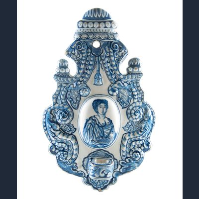 A Blue and White Dutch Delft Earthenware Sconce Decorated with a Figure - Lady