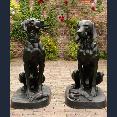 A Pair of French Life-Size Models of Hounds Entitled 'Deux Chiens Assis'