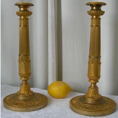 A PAIR OF FIRST EMPIRE CANDLESTICKS